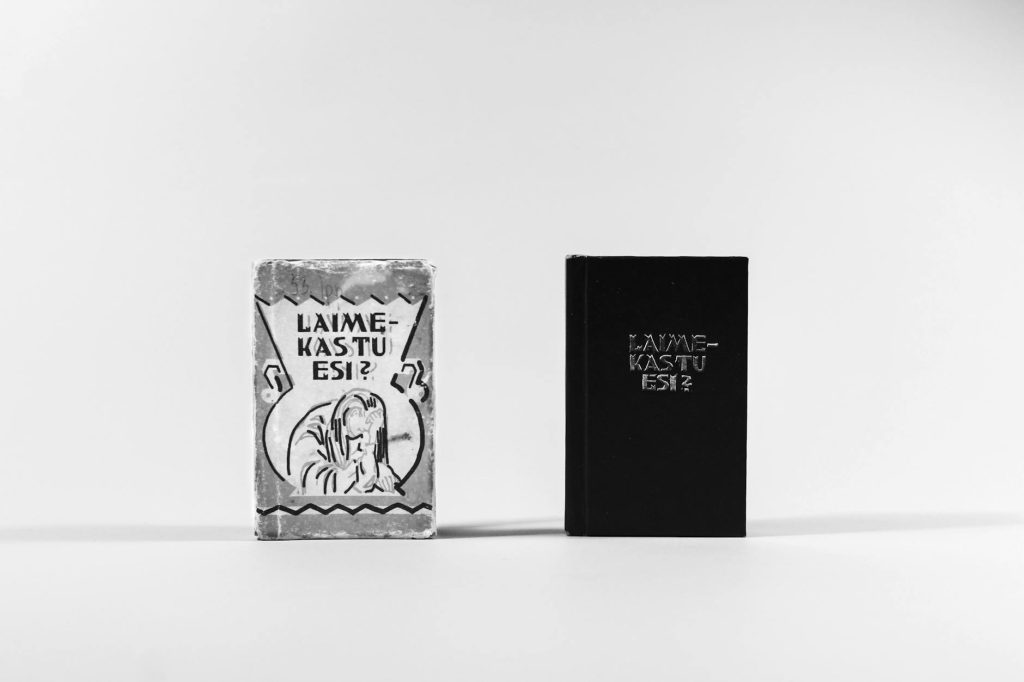 Two black and white book covers standing upright on a plain white background.