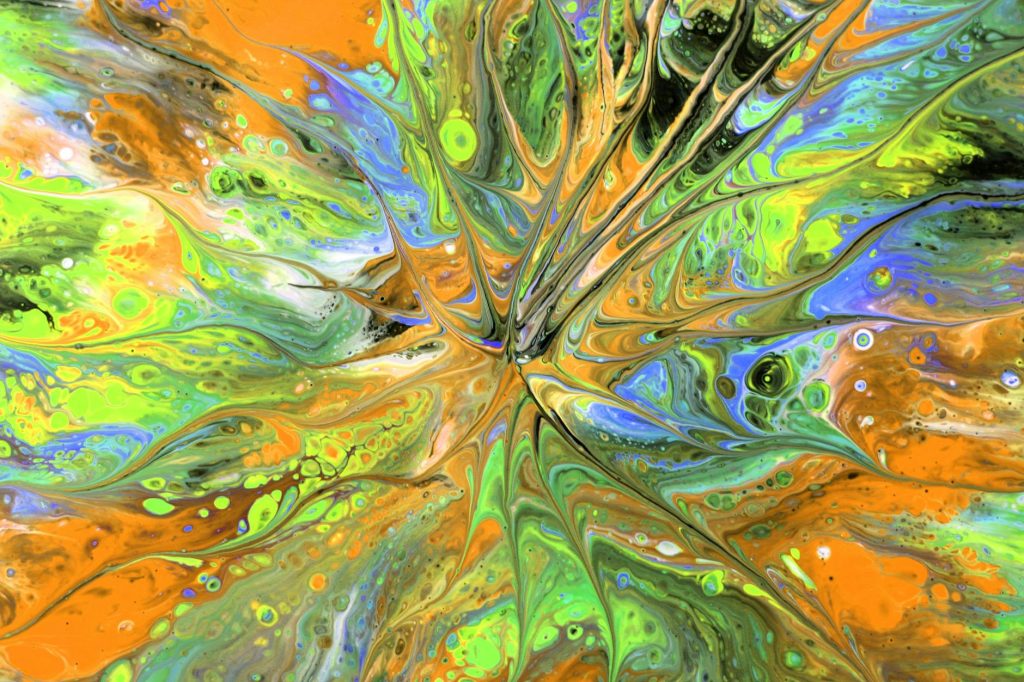 Colorful abstract painting with swirling patterns in vibrant orange, green, and blue hues.