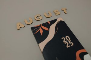 Flat lay of an August calendar with artistic design for 2025.